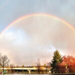 A rainbow over a bridge in Bellevue, Washington